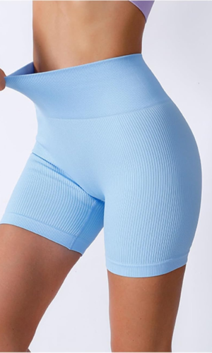 calza celeste corta mujer elastica deportiva ideal gimnasio y entrenamiento